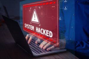 System hacked alert after cyber attack on computer network.